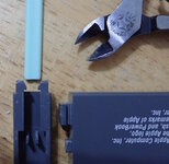 Trimming-plastic-stick-taper-to-spread-locking-tabs.jpg